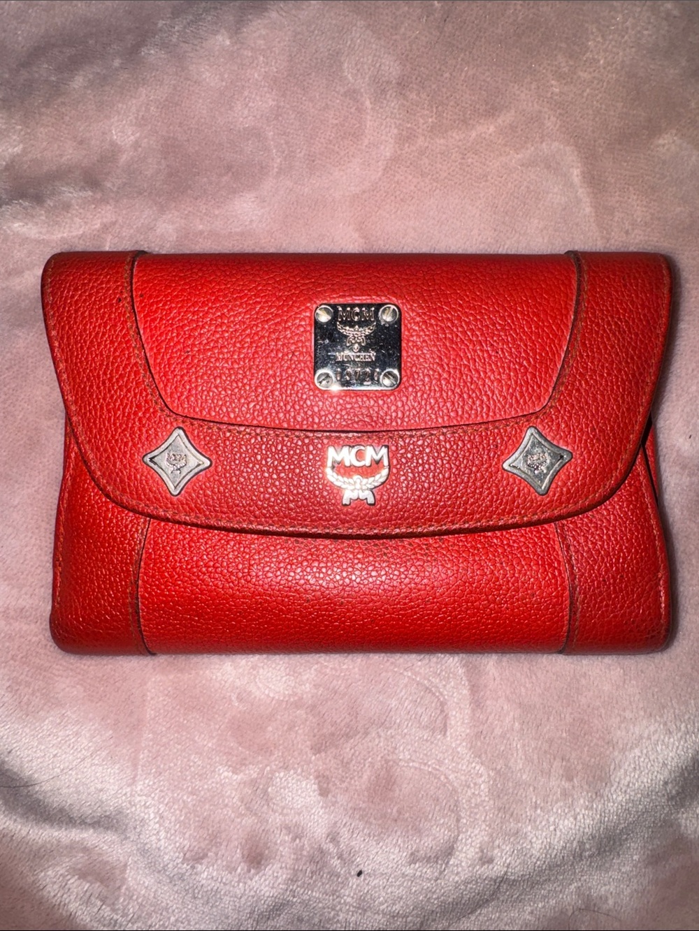 MCM Red Pebbled Leather Fold-Over Wallet.